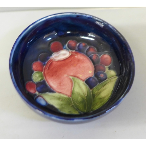 665 - A small early Moorcroft pin dish, 7.5cm