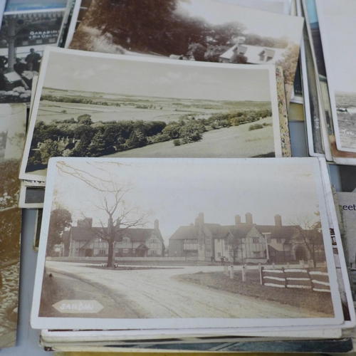 669 - A collection of Edwardian and later postcards, approximately 175 in total