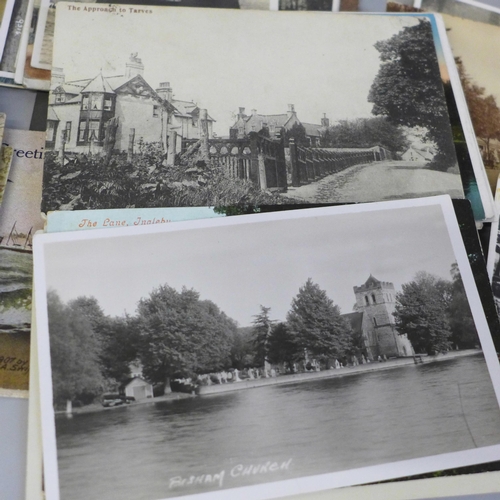 669 - A collection of Edwardian and later postcards, approximately 175 in total