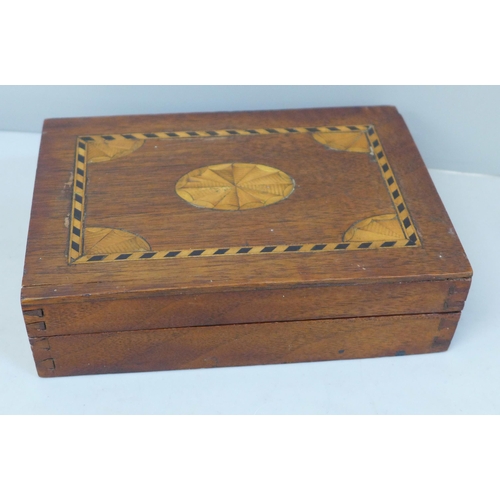 670 - An Edwardian marquetry inlaid card box