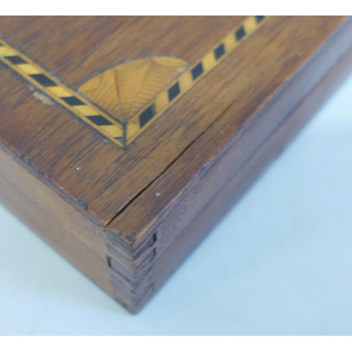 670 - An Edwardian marquetry inlaid card box