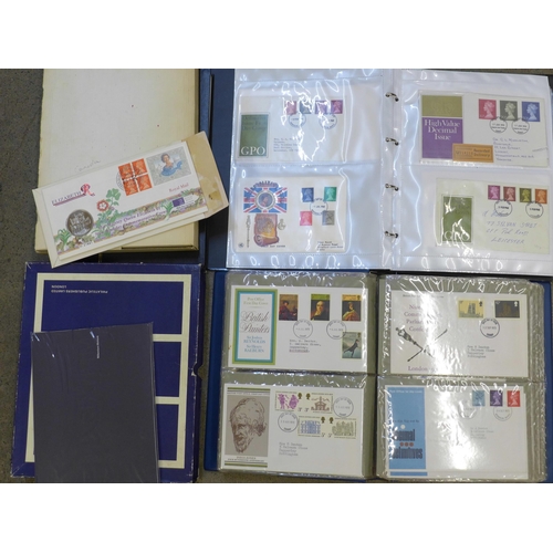 680 - An album of first day covers and some presentation packs, a £5 coin cover, an album of mixed stamps,... 