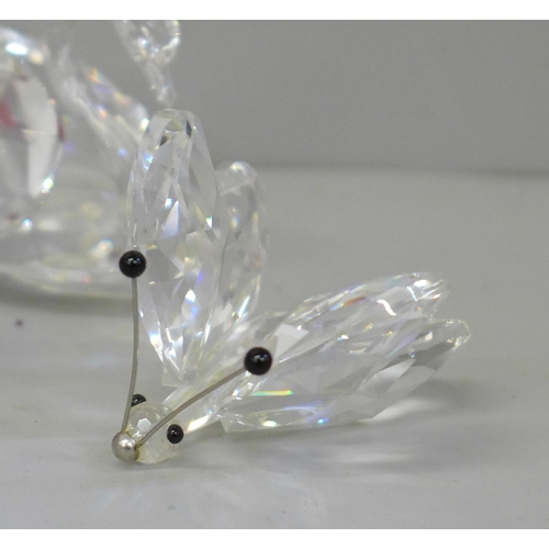 689 - Swarovski crystal animals, scent bottles, etc., including a pair of cranberry scents