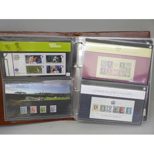 690 - Stamps; an album of GB presentation packs, 45 packs with a face value of over £120