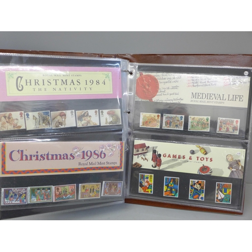 690 - Stamps; an album of GB presentation packs, 45 packs with a face value of over £120