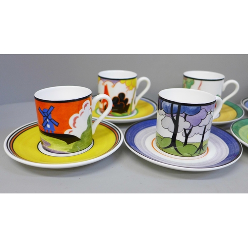 693 - A set of eight Wedgwood Bradford Exchange coffee cans and saucers, Centenary of Clarice Cliff