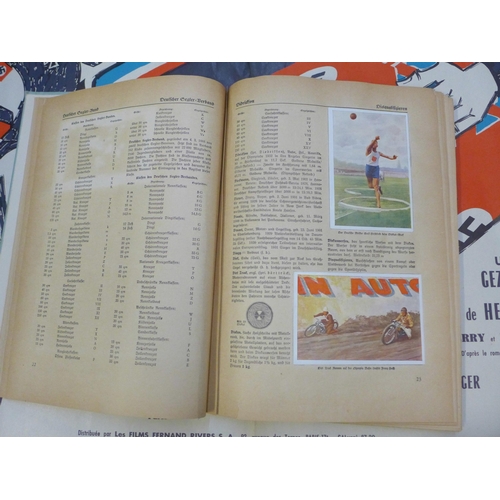 694 - A German book on sports containing collectable cards, complete, and a French film poster