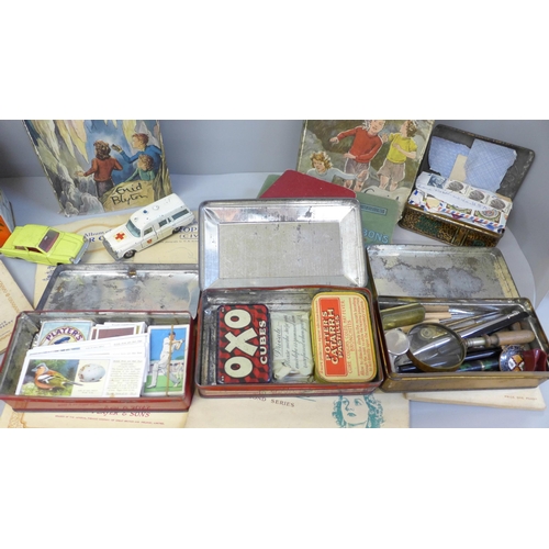 695 - A collection of tea cards, stamps, ephemera and books including Enid Blyton, etc.