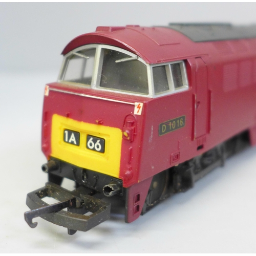 705 - An OO gauge Lima diesel Western Gladiator and four LMS maroon coaches