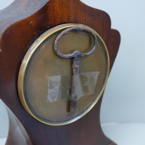 713 - An Edwardian inlaid mantle clock with key, a Maelzel metronome, a butterfly wing Art Deco style port... 