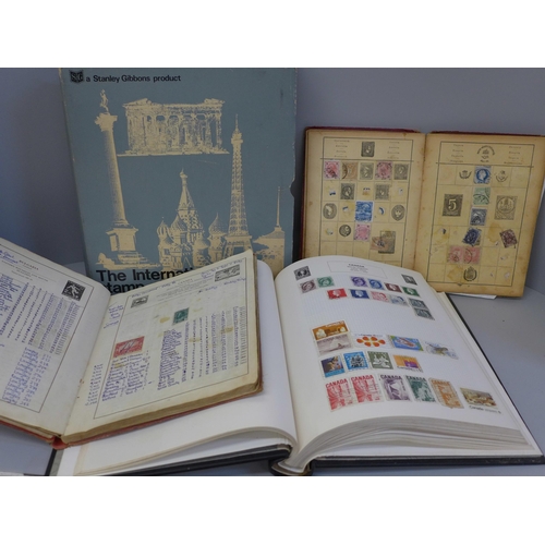 723 - A Stanley Gibbons International Stamp Album and two others