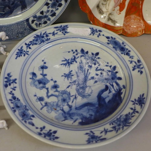 726 - Four Chinese export blue and white plates, a Kutani plate and four white china models of horses