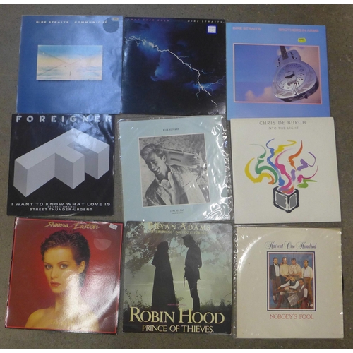 739 - A collection of 1980s pop and rock LP records, including Dire Straits, Foreigner, Sade, etc.