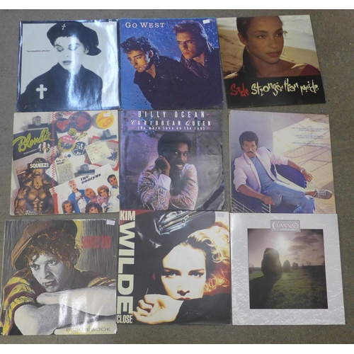 739 - A collection of 1980s pop and rock LP records, including Dire Straits, Foreigner, Sade, etc.