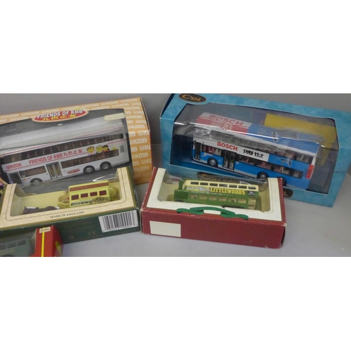 744 - A collection of Days Gone and other die-cast model buses and trams, approximately thirty