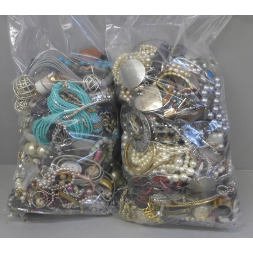 749 - Two bags of costume jewellery