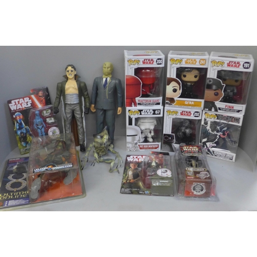 750 - A collection of Star Wars Action figures, pop figures, etc.