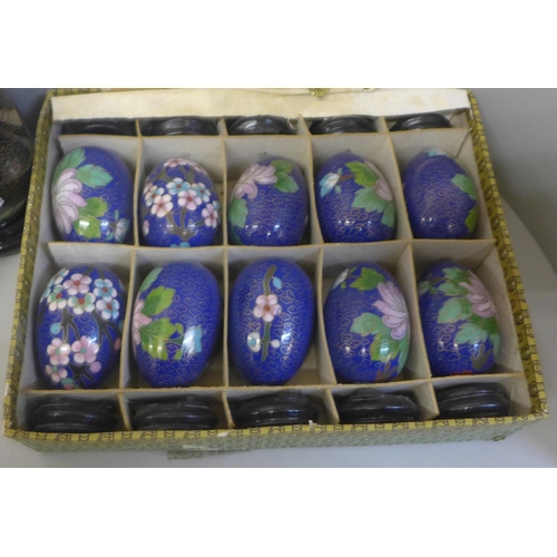 775 - Cloisonne eggs and stands and six cloisonne boxes