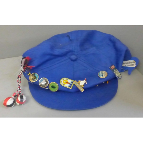 787 - Four hats with Scout/Girl Guide and other badges