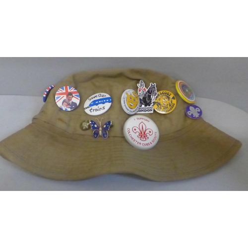 787 - Four hats with Scout/Girl Guide and other badges