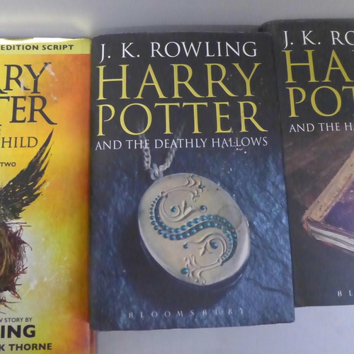 788 - A box of Harry Potter novels and two other books