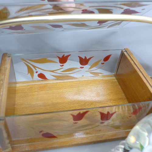 810 - A French biscuit box, an inlaid tray decorated with flowers, Sorrento ware, and a glass jug decorate... 