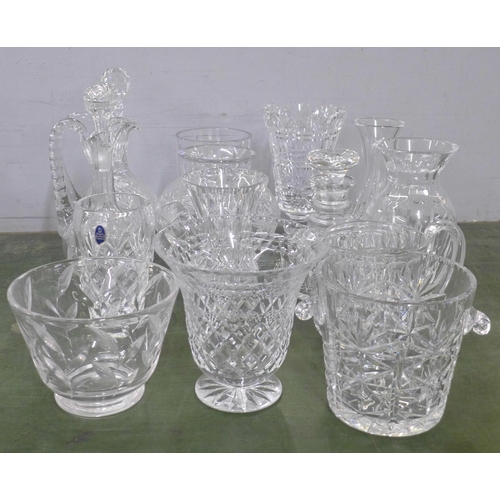 813 - A large collection of crystal and glass decanters, jugs, ice bucket, vases, fourteen in total **PLEA... 