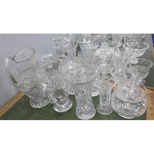 814 - A large collection of crystal and glass vases, sweeetmeat dishes, pitchers, jugs, etc., twenty-two i... 