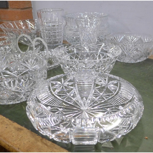 815 - A large collection of crystal and glass bowls, vases and a pair of baskets, fourteen in total **PLEA... 