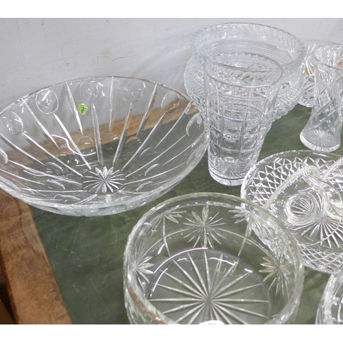 815 - A large collection of crystal and glass bowls, vases and a pair of baskets, fourteen in total **PLEA... 