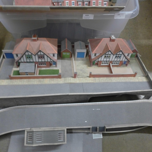 820 - A box of model rail buildings, laid out as a village **PLEASE NOTE THIS LOT IS NOT ELIGIBLE FOR POST... 