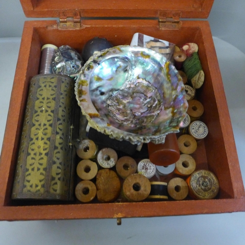 826 - Assorted items including sewing equipment in an Eastern style box and a Bells Scotch whisky decanter... 