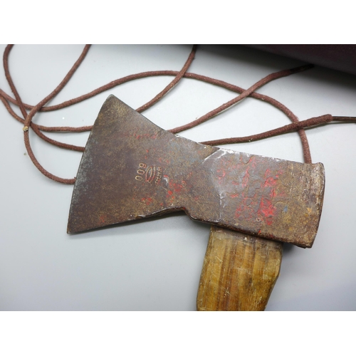 869B - A WWII German soldier axe stamped with Gebr. Pandel makers mark and leg protectors