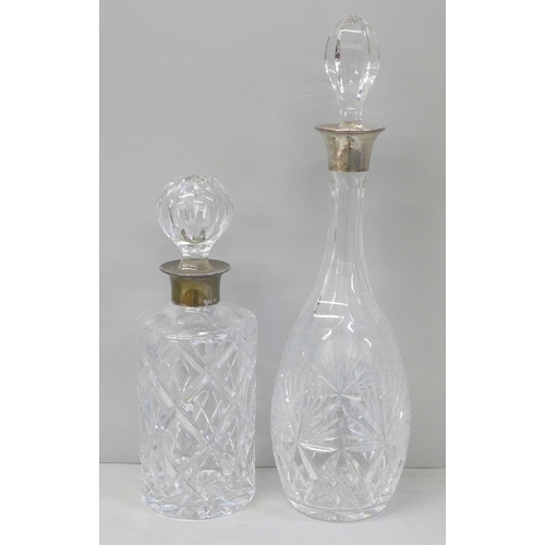 871 - Two silver collared cyrstal decanters