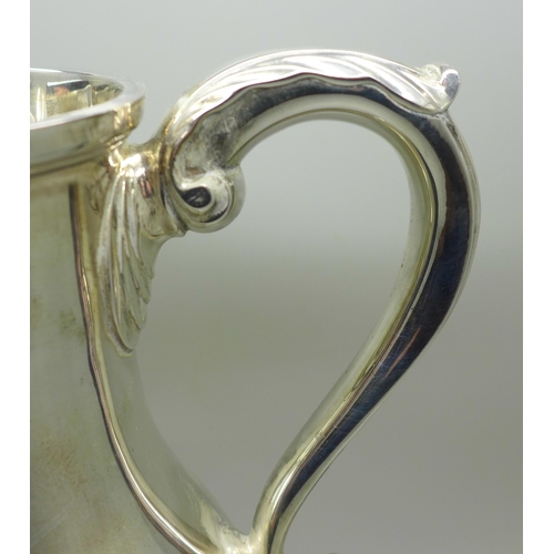 873 - A large silver pitcher, Mappin & Webb, London 1987, 213mm tall, 1080g