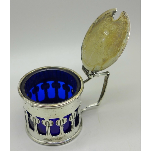 875 - An Art Nouveau design mustard, blue glass liner, 64g, Birmingham 1902