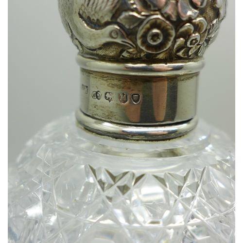 876 - A silver topped scent bottle, lid a/f and a silver mustard with green glass liner