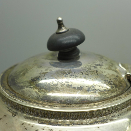 878 - A silver teapot, Birmingham 1932, dent to one area, 435g gross weight