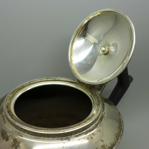 878 - A silver teapot, Birmingham 1932, dent to one area, 435g gross weight