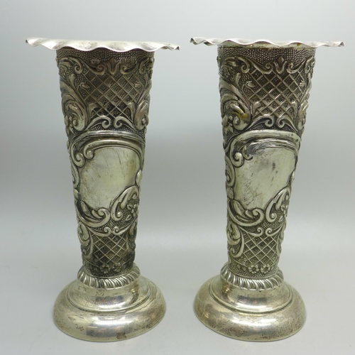 883 - A pair of embossed silver vases, Birmingham 1907, 162g, one a/f