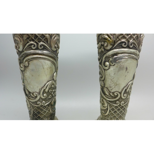 883 - A pair of embossed silver vases, Birmingham 1907, 162g, one a/f