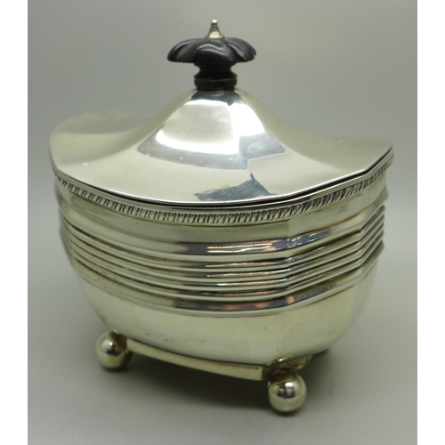 885 - A silver tea caddy with hinged lid, London 1893, 243g