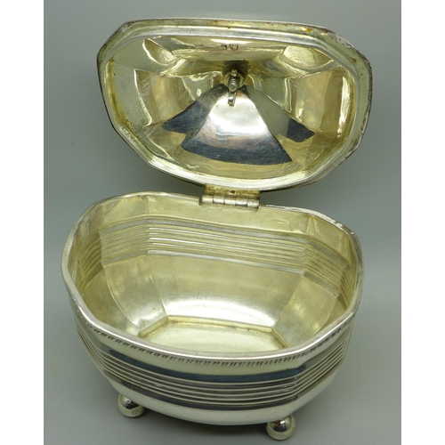 885 - A silver tea caddy with hinged lid, London 1893, 243g