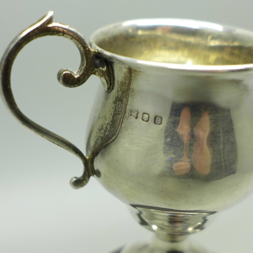 889 - A two handled silver trophy on stand, London 1937, 75mm tall, 39g