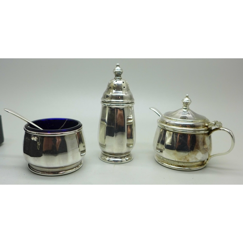 891 - A three piece EPNS cased cruet set by Walker & Hall