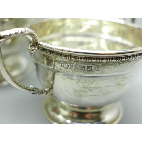 893 - A silver three piece tea service, Birmingham 1933, 614g