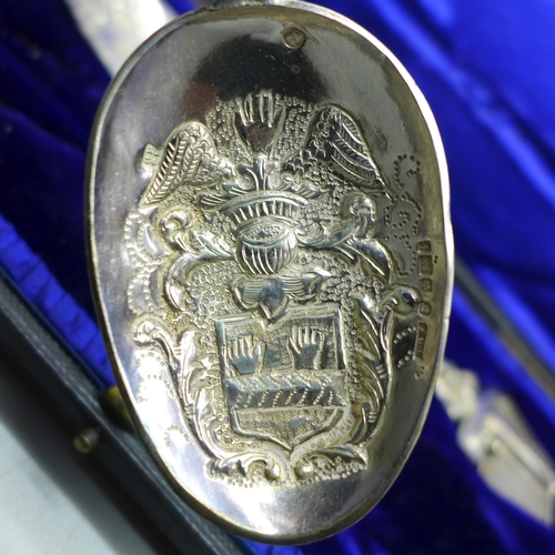 901 - A pair of silver spoons, finely decorated, with ship detail, Sheffield 1901, 145g, cased