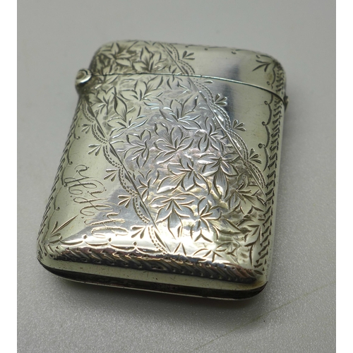 915 - A silver vesta case with hand engraved decoration and initials to corner, Birmingham 1898, 25g