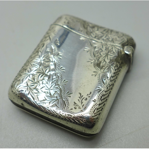 915 - A silver vesta case with hand engraved decoration and initials to corner, Birmingham 1898, 25g