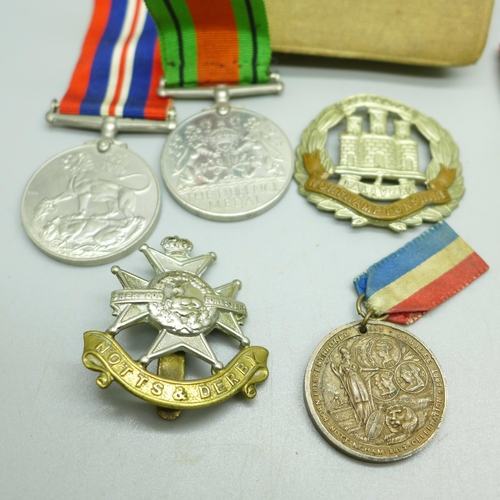 935 - A group of WWII medals including 1939-1945 Star, Burma Star, Sherwood Foresters and Northamptonshire... 